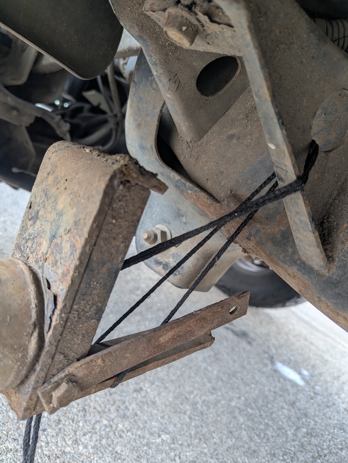 Broken steel truck step before mobile welding repair in Birmingham Alabama