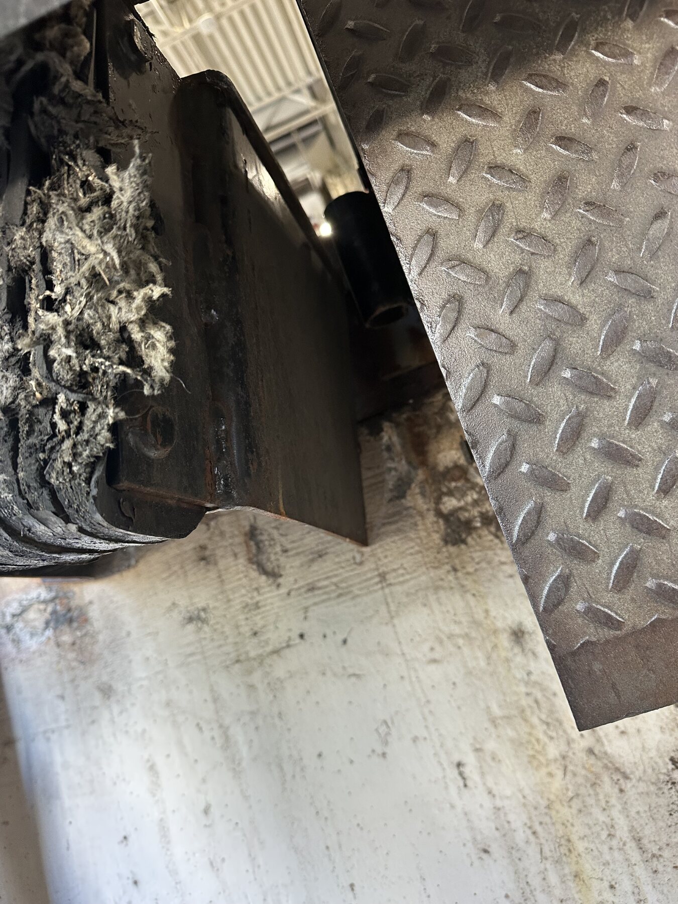Close view of failed weld on commercial loading dock steel