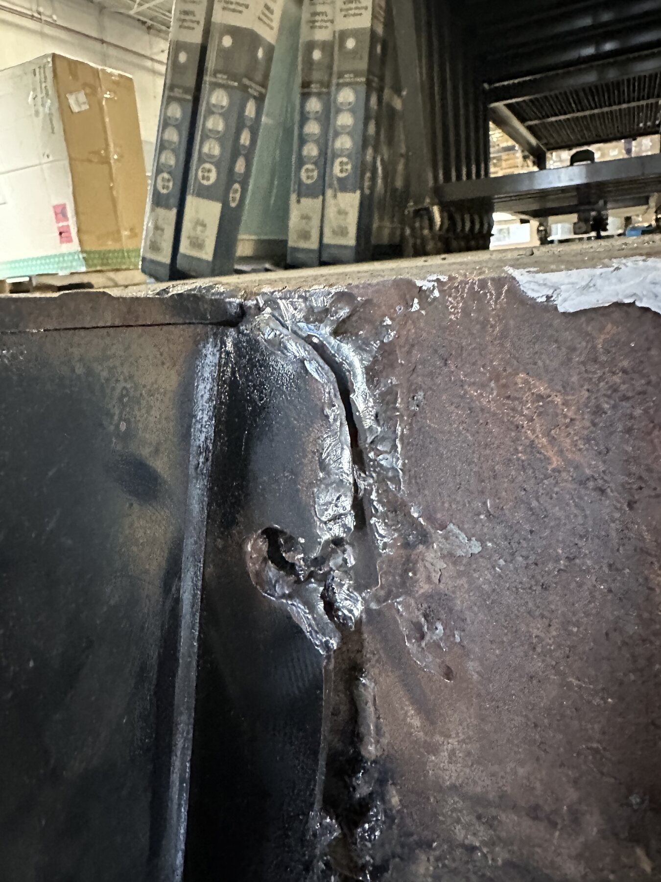Close-up of completed weld joining steel on the Lowe's loading dock