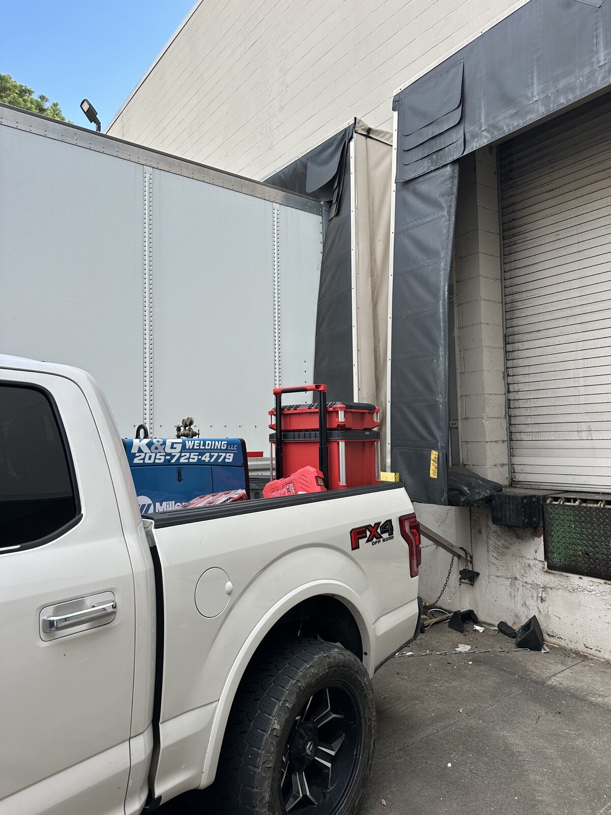 K&G Welding mobile service truck at a commercial loading dock